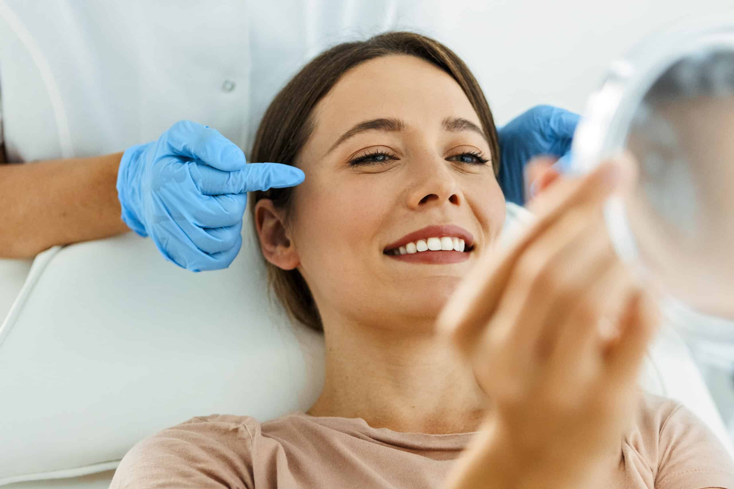 Young Beautiful Woman Having Various Facial Treatment